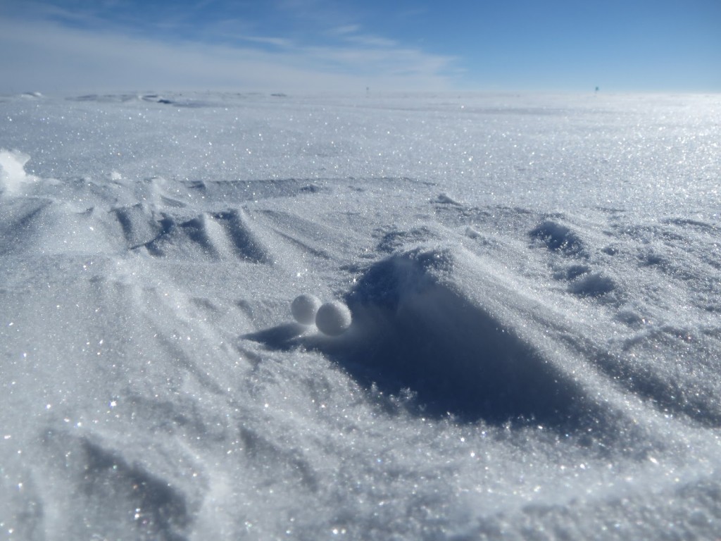 yukimarimo ice sphere balls rest on the greenland ice sheet